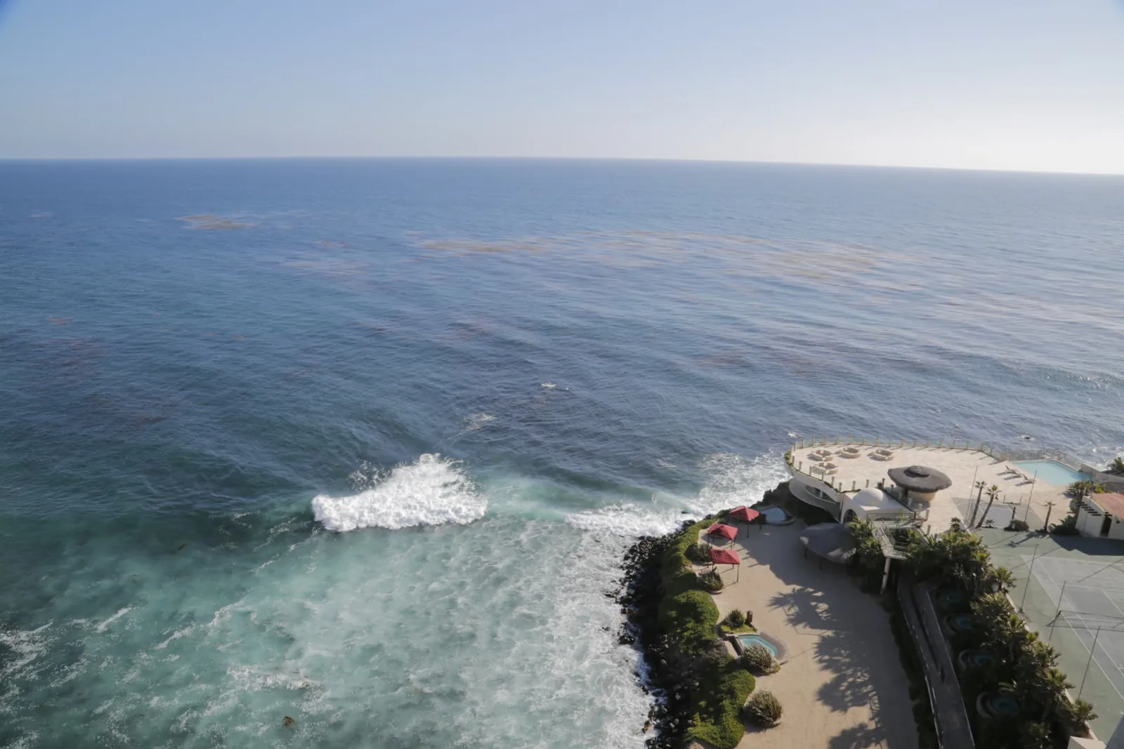 Aerial view of the Pacific coastline beside the Holistic Sanctuary property