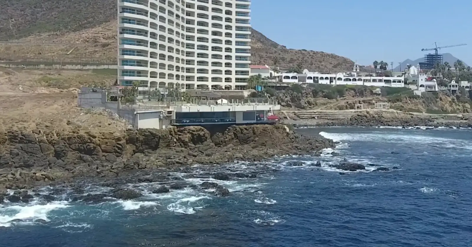 The Holistic Sanctuary healing centre on the cliffs above the rocky Pacific shoreline